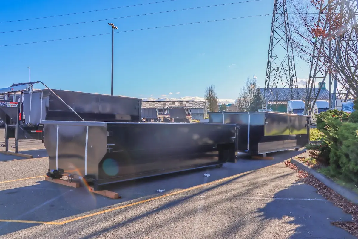 Roll-off dumpster ready for waste disposal at job site for Construction Dumpster Rental in Primera